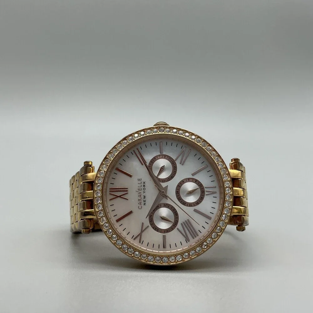 Caravelle New York Womens Watch 38mm MOP Gold Tone Day Date New Battery 5.75